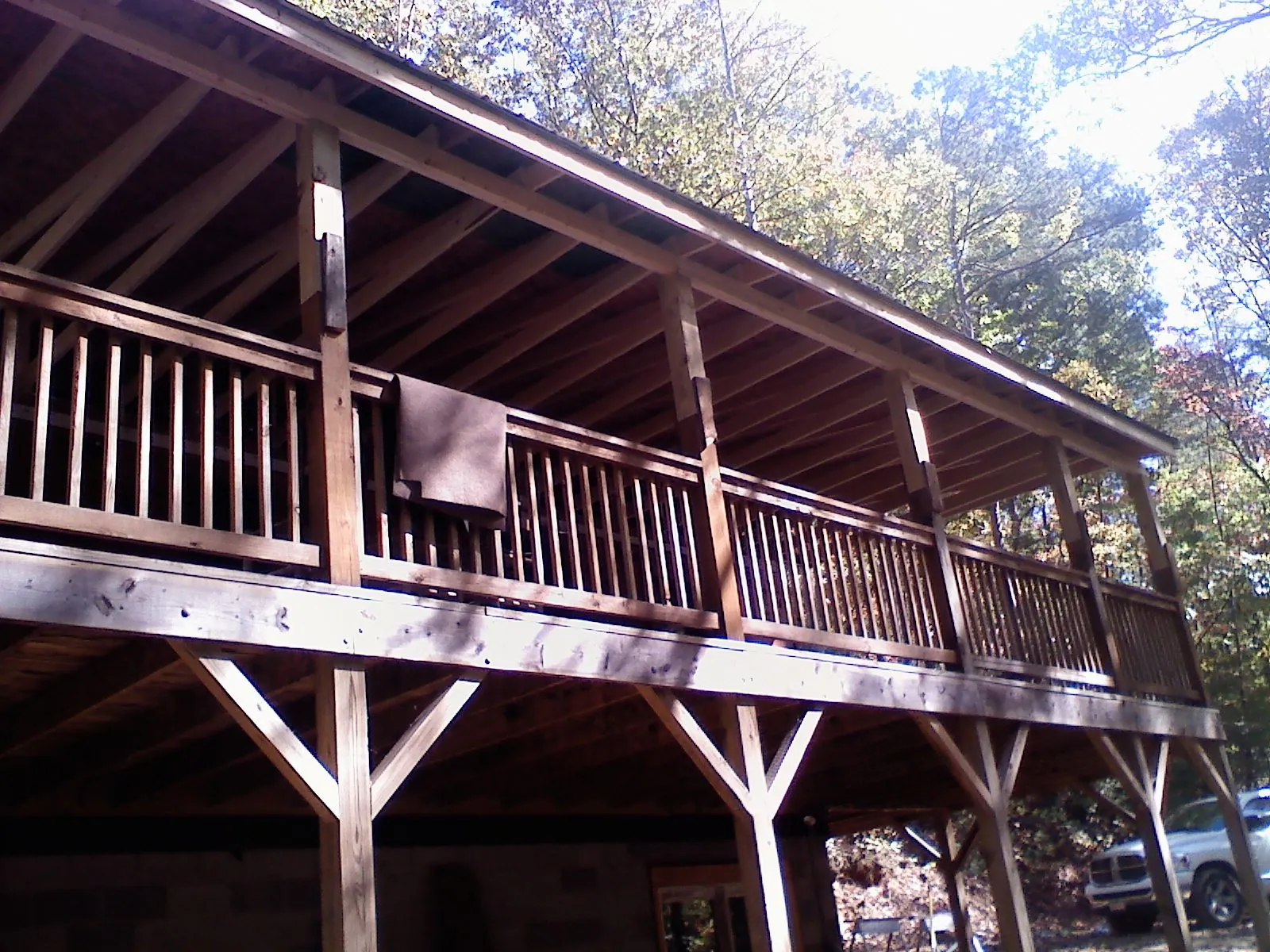 Timber framing under a new elevated porch and deck — Roof Leak Repair in Spring Church by Roofing Brothers